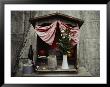 Close View Of A Shrine With Offerings Of Tangerines And An Apple by Sam Abell Limited Edition Pricing Art Print