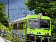 Train Departs Interlaken Ost Train Station, Interlaken, Switzerland by Robert Eighmie Limited Edition Print