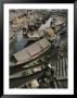 Houseboats Line A Waterway Through A Poor Kashmir Town by Gordon Wiltsie Limited Edition Print