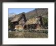 Reflection Of Gasshou Zukuri Thatched Roof Houses, Ogimachi, Honshu Island, Japan by Christian Kober Limited Edition Print