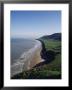Looking From The Cliffs At Rhossili, Towards Llangennith At Far West Of The Gower Peninsula, Wales by Charles Bowman Limited Edition Print