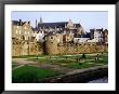 Gardeners Planting Spring Display In Front Of Medieval Ramparts, Vannes, Brittany, France by Diana Mayfield Limited Edition Print