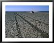 Four-Wheel Drive Vehicle Crossing Desert Plain, Grand Bara, Djibouti by Frances Linzee Gordon Limited Edition Print