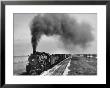 View Of A Freight Train Crossing An Open Prairie by Thomas D. Mcavoy Limited Edition Pricing Art Print