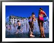 Children Playing In Piccadilly Gardens Waterjets, Manchester, England by Mark Daffey Limited Edition Print