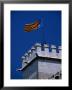 Flag Flies Over The 15Th Century Lonja Silk And Commodity Market, Valencia, Spain by Johnson Dennis Limited Edition Print