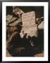 A Man Inscribes A Stone Marker With The Name Of A Climber Killed On Mount Everest by Barry Bishop Limited Edition Print