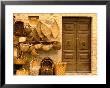 Montalcino, Basket Seller And Wall, Tuscany, Italy by Walter Bibikow Limited Edition Print