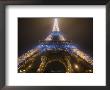 Looking Up At Eiffel Tower In Fog And Rain At Night, Paris, France by Jim Zuckerman Limited Edition Pricing Art Print