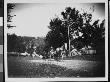 The Very Stout Mr. Reuben Wilbur Riding Up A Country Road In A Horse-Drawn Cart by Wallace G. Levison Limited Edition Print