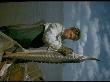 Fisherman Holding Osetra Sturgeon At Tanya Avangardnaya In Volga River Delta, Russia by Carl Mydans Limited Edition Print