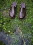 A Pair Of Shoes In Soggy Grass By A Creek by Jann Lipka Limited Edition Pricing Art Print