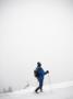 Skier Walking On A Snow Covered Hill by Julia Sjoberg Limited Edition Print