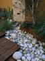 Roof Garden With Bamboo Fencing, White Boulders, Cedar Decking And Water Feature by Clive Nichols Limited Edition Print