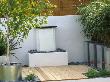 Modern Garden With Fountain, Galvanised Metal Containers, White-Washed Walls by Clive Nichols Limited Edition Print