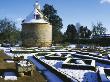 Pigeon House And Rose Parterre At Rousham Park, Oxfordshire In Winter by Clive Nichols Limited Edition Pricing Art Print