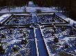 The Snow Covered Knot Gardens At Great Fosters, Surrey by Clive Nichols Limited Edition Print