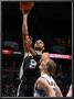 San Antonio Spurs V Minnesota Timberwolves: Tony Parker And Luke Ridnour by David Sherman Limited Edition Print