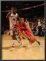 Houston Rockets V Toronto Raptors: Kevin Martin And Amir Johnson by Ron Turenne Limited Edition Pricing Art Print