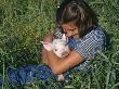 Girl Holding Domestic Piglet, Mixed Breed, Usa by Lynn M. Stone Limited Edition Pricing Art Print