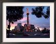 Traffic Passes By The Angel Of Independence Monument In The Heart Of Mexico City by John Moore Limited Edition Print