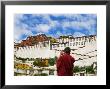 Tibetan Monk With Potala Palace, Lhasa, Tibet, China by Keren Su Limited Edition Pricing Art Print