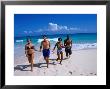 Happy Couples At Natural Arches Beach In Bermuda by Lee Foster Limited Edition Pricing Art Print
