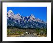 Vehicles At National Park Entrance, With Mountains Beyond, Grand Teton National Park, Wyoming by Holger Leue Limited Edition Print