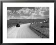 Car Driving From Omaha Nebraska To Salt Lake City Utah On Highway 30 by Allan Grant Limited Edition Print