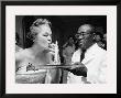 Woman Lighting A Cigarette From A Candle Held By A Waiter At The Piedmont Ball by Paul Schutzer Limited Edition Print