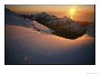 Sunset Glow Over A Snowy Mountain Face by Annie Griffiths Belt Limited Edition Print