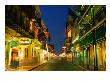 Flags Hanging Over The Empty Bourbon Street At Night, New Orleans, Louisiana, Usa by Richard Cummins Limited Edition Print