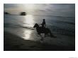 Horseback Rider Silhouetted On Beach, Costa Rica by Michael Melford Limited Edition Print