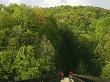 Cyclists Cross A Bridge On The Youghiogheny River Trail by Joel Sartore Limited Edition Print