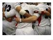 Rugby Players Huddle In A Scrum At The Annual Rugby Sevens by Eightfish Limited Edition Pricing Art Print