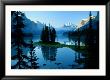 Scenic View Of The Lake Surrounded By Evergreens And Snow-Capped Mountains by Raymond Gehman Limited Edition Pricing Art Print