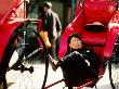 Rickshaw Puller At Star Ferry Pier, Hong Kong, China by Alain Evrard Limited Edition Print