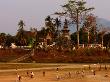 Boys Playing In Front Of That Luang Temple, Luang Prabang, Laos by Alain Evrard Limited Edition Print