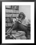 French Actress Barbara Laage, Alone In Her Apartment Reading by Nina Leen Limited Edition Print