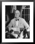 Portrait Of President Franklin Roosevelt Alone, Smiling, At Desk In White House by George Skadding Limited Edition Pricing Art Print