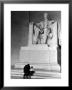 Black Man And Small Boy Kneeling Prayerfully On Steps On Front Of Statue In The Lincoln Memorial by Thomas D. Mcavoy Limited Edition Print