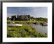 The Castle And Estuary At Laugharne, Carmarthenshire, Wales, United Kingdom by Rob Cousins Limited Edition Print