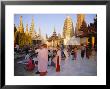 Buddhist Worshippers At The Shwedagon Paya (Shwe Dagon Pagoda), Yangon (Rangoon), Myanmar (Burma) by Christina Gascoigne Limited Edition Print