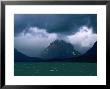 Many Glacier And Lake Sherburne And Storm Clouds, Glacier National Park, Usa by John Elk Iii Limited Edition Print