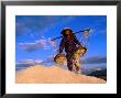 Female Labourer Carrying Sea Salt In Salt Fields Of Doc Let Beach, Khanh Hoa, Vietnam by John Banagan Limited Edition Print