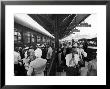 Travelers Arriving At The Train Station In The Resort And Convention City by Alfred Eisenstaedt Limited Edition Pricing Art Print