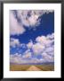 Cumulus Clouds Over Dirt Road And Prairie by John Eastcott & Yva Momatiuk Limited Edition Print