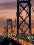 San Francisco Bay Bridge Lit Up At Night by Fogstock Llc Limited Edition Print