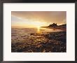 Bamburgh Castle At Sunrise, Northumberland, England by Lee Frost Limited Edition Print