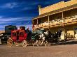 Stagecoach In Motion At Old Tucson Studios by Eddie Brady Limited Edition Pricing Art Print